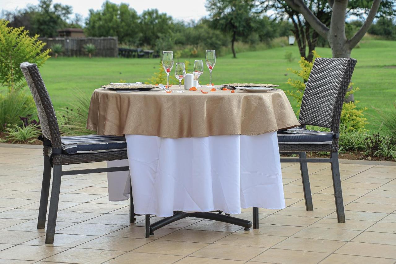 Royal Marang Hotel Phokeng Exterior foto A table with a tablecloth